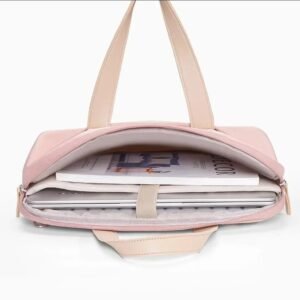 Intérieur spacieux de la sacoche rose pour ordinateur 14 pouces avec compartiment matelassé antichoc.