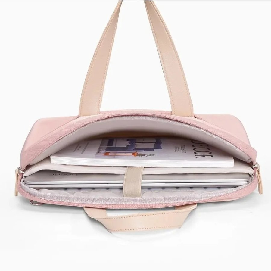 Intérieur spacieux de la sacoche rose pour ordinateur 14 pouces avec compartiment matelassé antichoc.